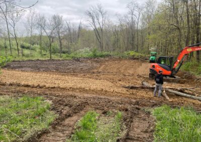 Excavator preparing site for new development